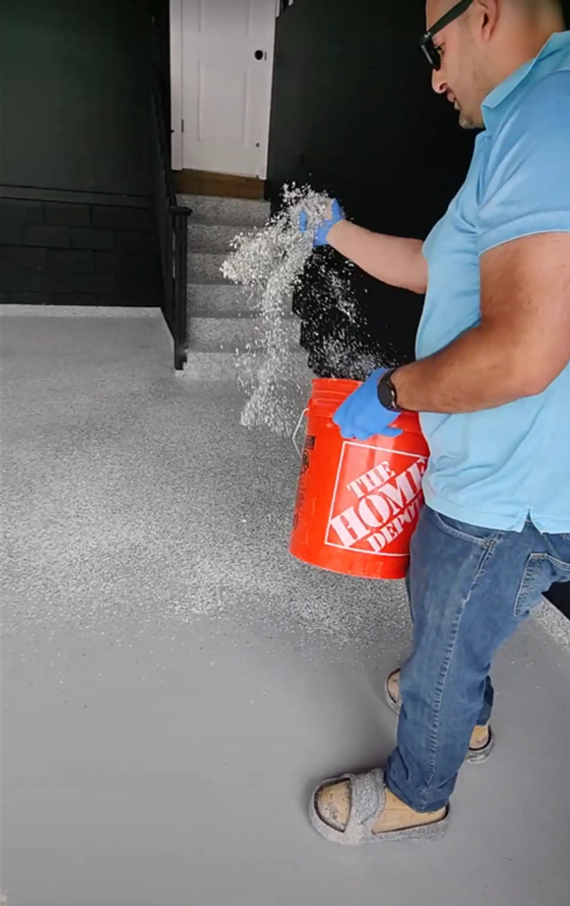 Broadcasting decorative flakes into epoxy garage floor